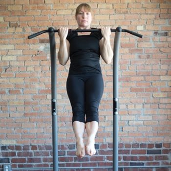 Periodization: Cycling Your Training to Reach Multiple Goals 6 Kirsty performs pull-ups on a bar