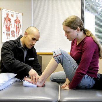 Jarlo physical therapist evaluating patient
