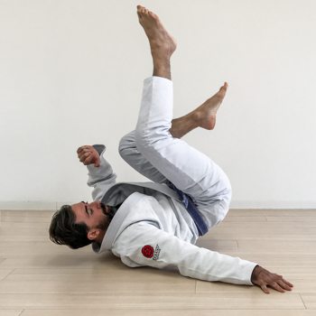 Ryan performing brazilian jiu jitsu roll