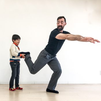 5 Strategies to Make Training with Your Kids Fun and Effective... for Both of You 6 Ryan’s son helping him to be more flexible with a single leg forward lean