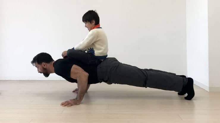 5 Strategies to Make Training with Your Kids Fun and Effective... for Both of You 1 Ryan Hurst's son helping him with a push up