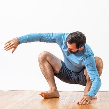 Demonstrating optimal hip range of motion in a deep squat