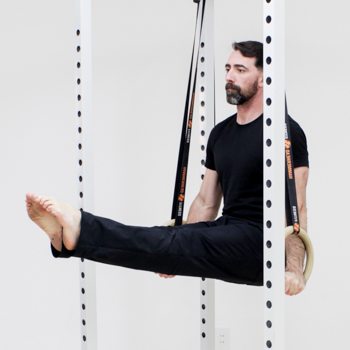 Hand Wraps, Grips, & Other Hand Care Methods for Using Gymnastic Rings 1 Ryan Hurst performing an angled lsit on rings