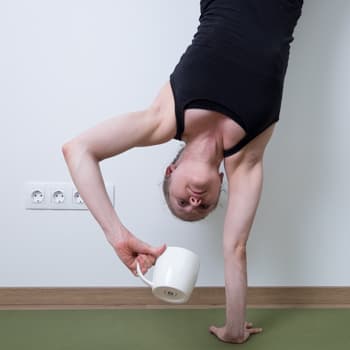 Minimal Morning Mobility Routine - 4 Minutes is All You Need 1 Alicia Holding Coffee Handstand
