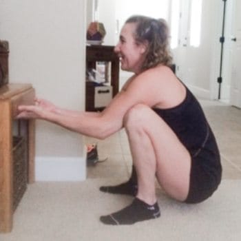 Despite the Challenge, This Woman Proves Progress with MS is Possible 1 Dana performing a squat with support