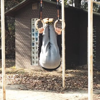 German Hang Tutorial: Use Gymnastic Rings to Improve Shoulder Mobility 8 german hang legs in the air technique