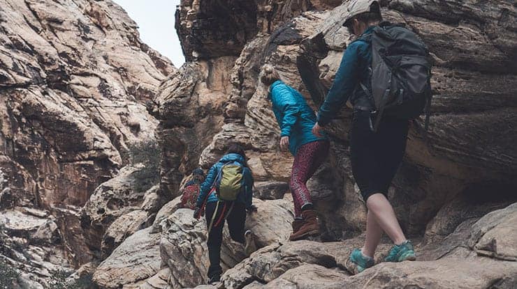 New Year's Resolutions are for Suckers - Just Take the First Damn Step (and keep on taking them) 1 A group hiking up a mountain