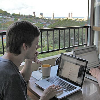 Staying Healthy With a Desk Job: Strategies and a Quick Desk Stretching Routine 4 sitting at computer