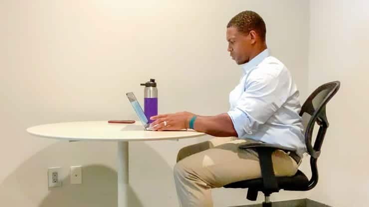 Staying Healthy With a Desk Job: Strategies and a Quick Desk Stretching Routine 1 Man working at desk