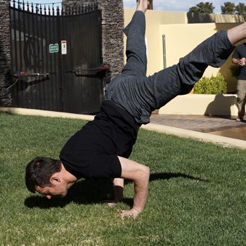 Bodyweight Exercise for Tall People and Why it's Not Out of Reach 4 Jeff doing a bent arm stand