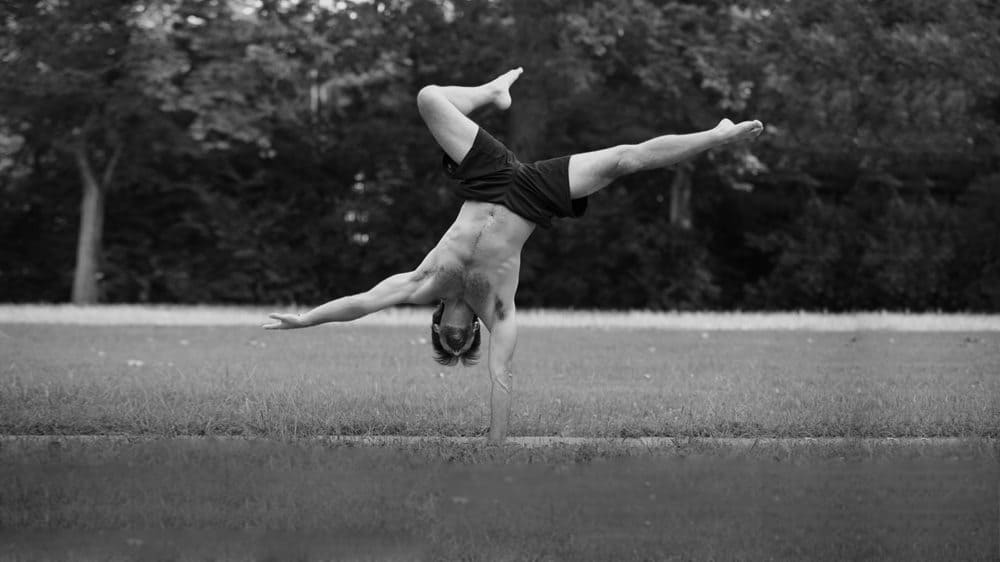 Ryan doing a One Arm Handstand