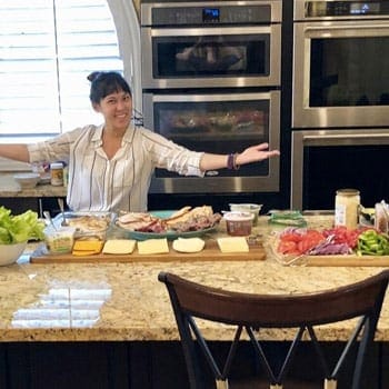Active Recovery: Your Guide To Moving Better With Less Pain 3 preparing a lunch spread of nutrient-dense foods