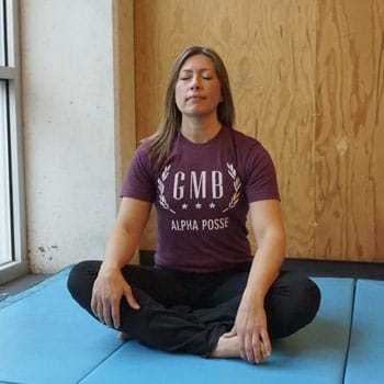 Active Recovery: Your Guide To Moving Better With Less Pain 5 Stacey sitting and meditating