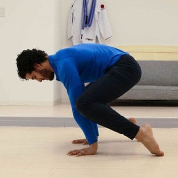 How to Get into the Crow Pose, Even if You've Never Been Able to Do It 7 Chris leaning into crow exercise
