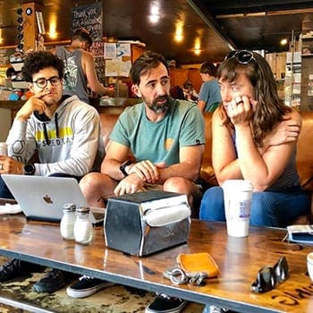 Training While Traveling: Maintaining an Exercise Routine On The Go 6 Group of people talking
