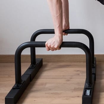 The Benefits of Parallettes Training and How to Overcome Challenges 4 Close up of grip on parallettes