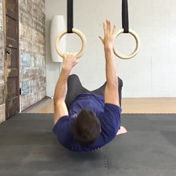 Jeff doing a one arm row rings exercise