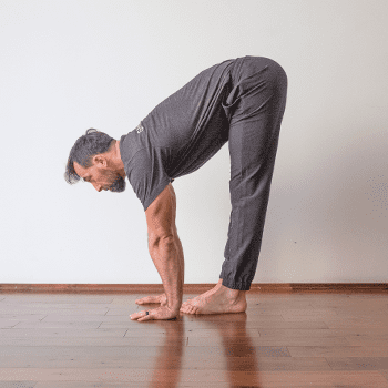 Tight Hamstrings? Effective Stretches and 6 Tips for Hamstring Flexibility 1 forward fold touching the floor