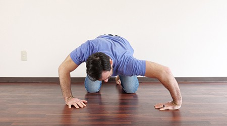 Ryan demonstrating a shoulder stretch