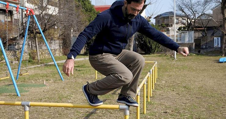 Ryan Balancing On A Rail Ryan in minimal shoes on a rail