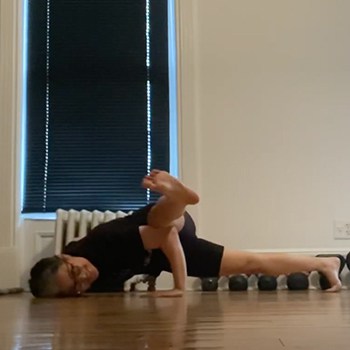Fixing 30 Years of Deskbod: How this Graphic Designer Loosened Painful Joints and Got Strong 6 GMB Elements client Kamomi practicing the Spiderman