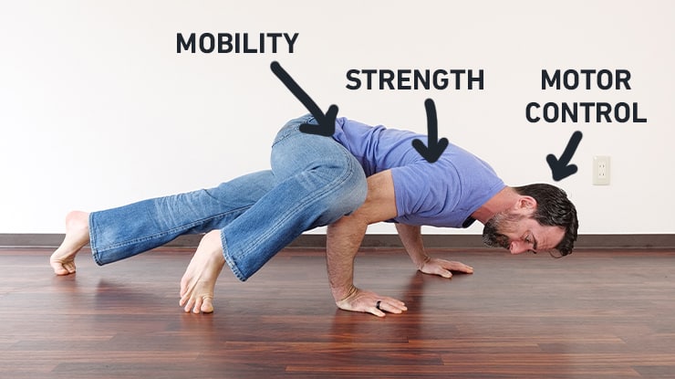 GMB Fitness Head Coach Ryan Hurst demonstrating a movement that trains strength, flexibility, and motor control