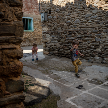 Not Just for Fun: How 'Play' Can Actually Make Your Training More Effective 4 Kids playing hopscotch in an alley