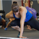 Woman performing locomotion exercise