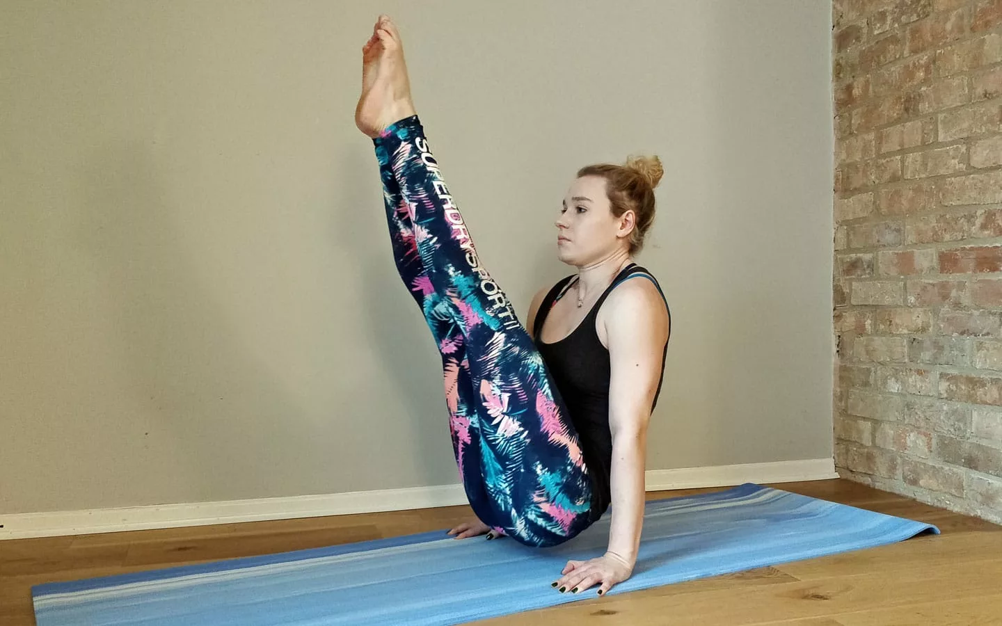 The V-Sit is a compression strength exercise