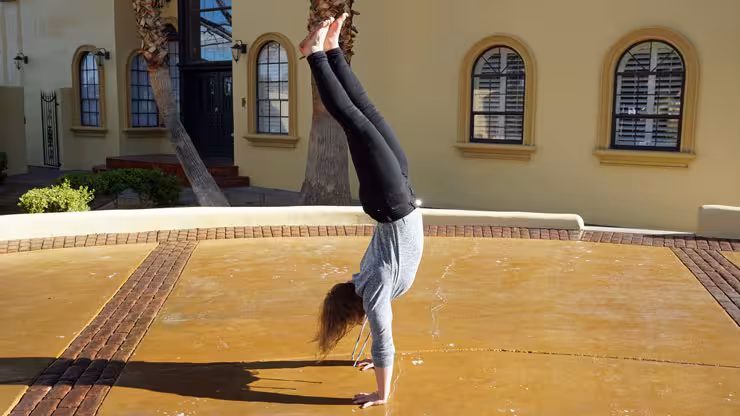 this handstand isn't perfect, but that's ok, because this person is having a good time